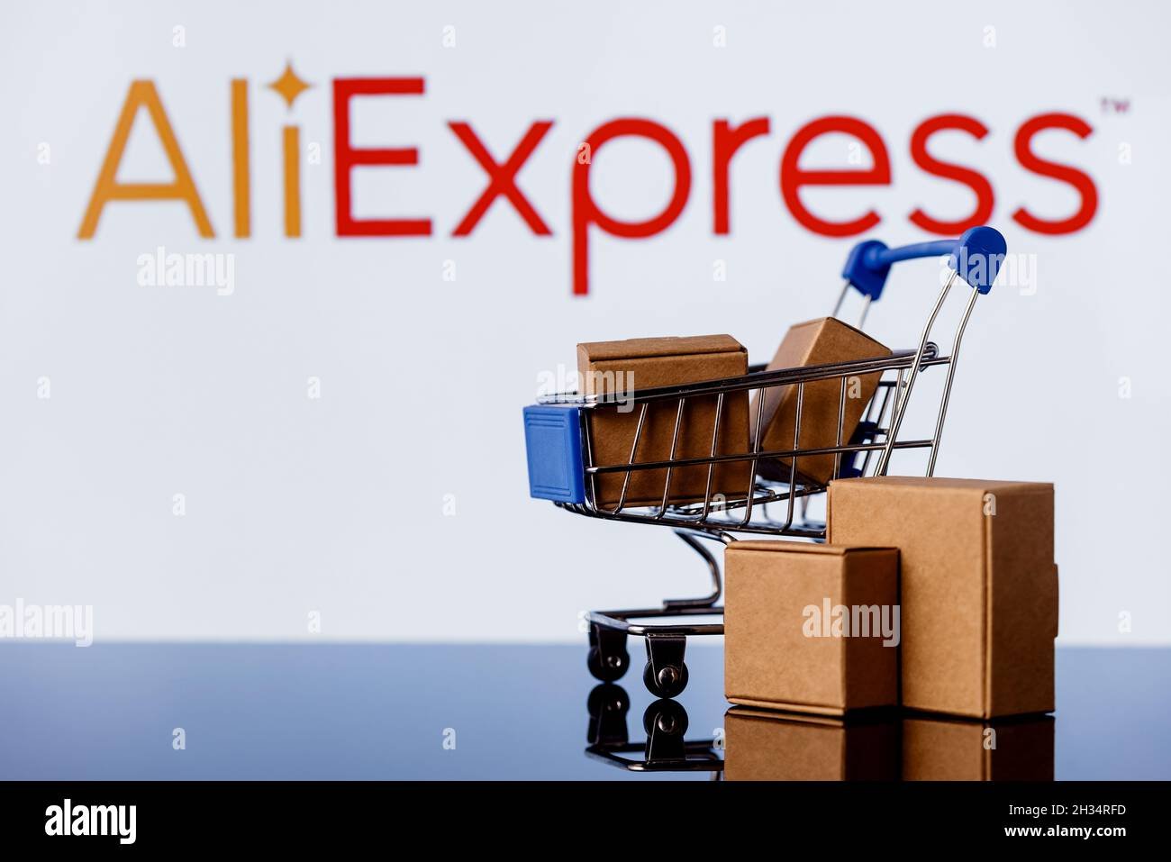 aliexpress-is-an-chinese-online-retail-service-shopping-cart-with-parcels-on-the-background-of-the-aliexpress-logo-2H34RFD